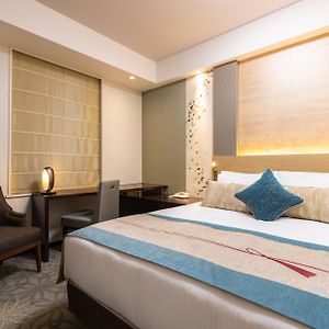 Kamer met een Queen Size Bed